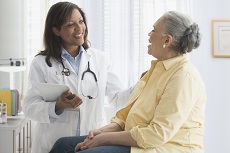 Doctor talking with patient